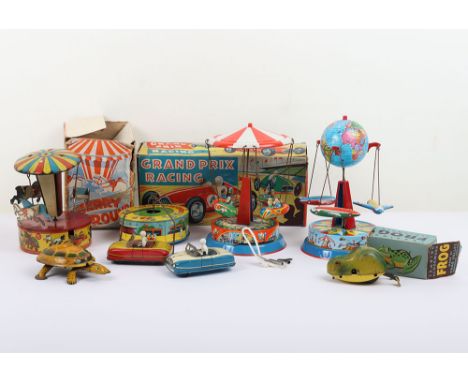 Codeg boxed tinplate Grand Prix Racing toy, clockwork tin printed centre operating twin racing cars, good working condition, 