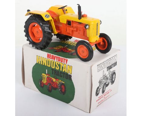 Maxwell India Heavy Duty Hindustan Tractor, large scale, orange/yeloow body, jewelled lights, in near mint boxed original con