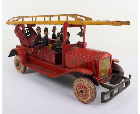 A Large Distler German tinplate clockwork Fire engine circa 1920’s,  lithographed tin plate body, two seated firemen and four