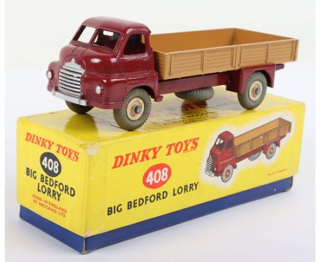 Dinky Toys 408 Big Bedford Lorry, maroon cab/chassis, light tan back, beige wheel hubs, in near mint original condition, 522 