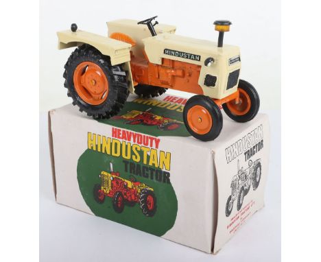Maxwell India Heavy Duty Hindustan Tractor, large scale, orange/cream body, jewelled lights, in near mint boxed original cond