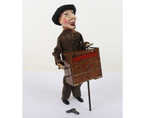 Scarce S.I.J.I.M (Fernand Martin) clockwork Organ Grinder, French circa 1910, with painted composition head, lead hand and we
