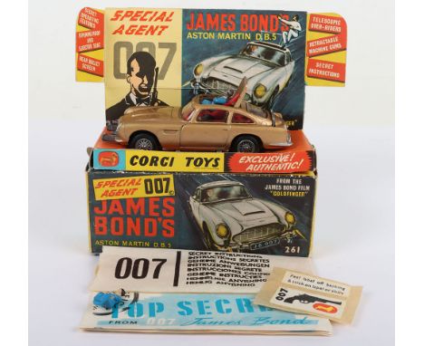 Vintage 1960’s Corgi Toys 261 James Bond Aston Martin D.B.5 from the Film Goldfinger gold body, with working ejector seat, re