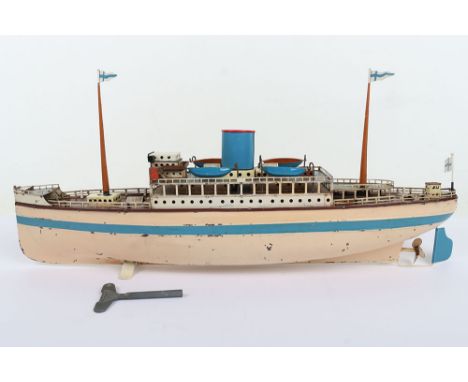 GFN Fleischmann tinplate clockwork Ocean Liner, 1950s, cream painted hull with blue waterline, brown decks and white superstr