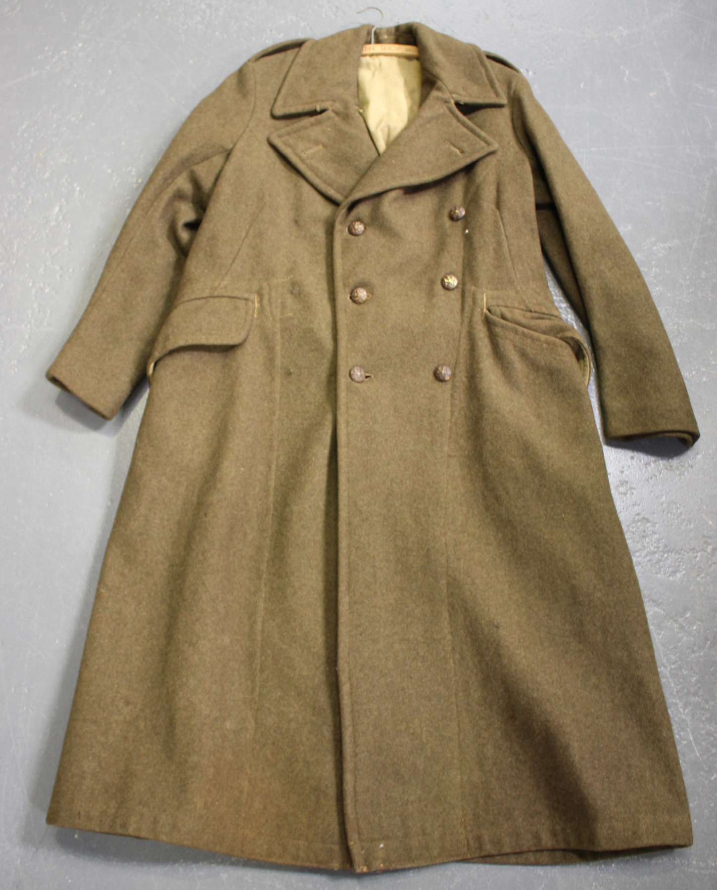 A 1939 pattern greatcoat with general service buttons, another ...