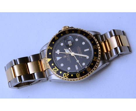 An 18ct gold and stainless steel gentleman's Rolex Oyster Perpetual Date GMT Master II Superlative Chronometer wristwatch, ci