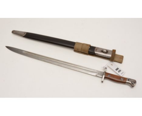 A World War I bayonet, stamped 'RE, ELSCH, 141' to hilt and rubbed stamps to blade with crown emblem, wooden handle to hilt, 