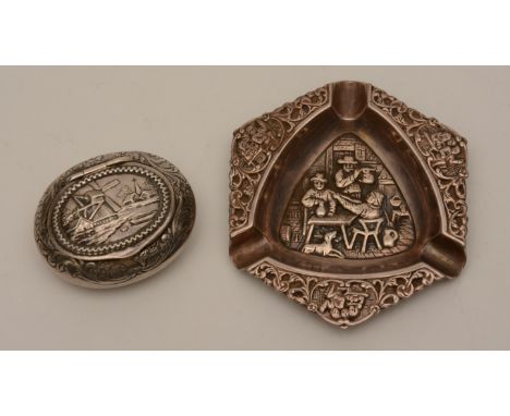 A 19th century Dutch silver snuff box, the hinged lid decorated with embossed panel of town scene with windmill, foliate frie