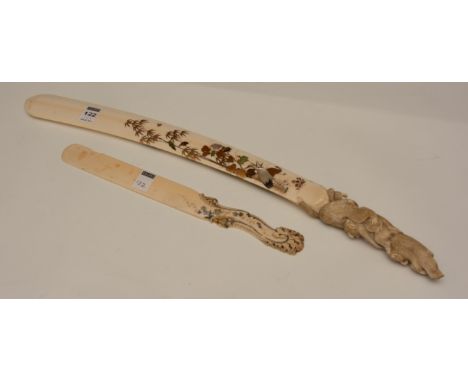 A large Meiji period Japanese shibayama decorated ivory page turner, the blade decorated with mother of pearl and jade birds 