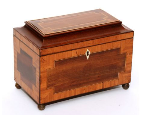 A George III mahogany, rosewood and satinwood inlaid tea caddy, with ivory escutcheon, raised on ball feet, 16cm high x 20.5c