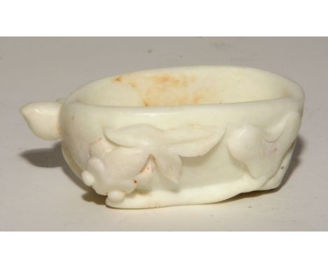 A Chinese Qing Dynasty white jade brush water, decorated with carp and water lily, 10cm wide