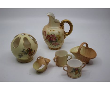 A group of early 20th Century Royal Worcester blush ivory ware including: a pomander decorated with flowers, puce mark no: 99