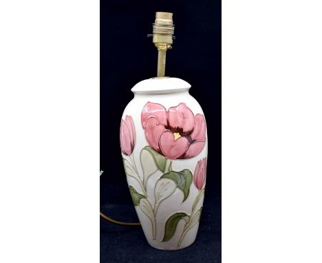 A Moorcroft magnolia style table lamp, late 20th CenturyCR: no shade, no cracks or chips