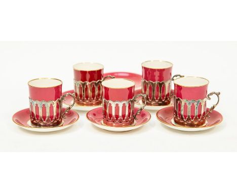 A set of five Aynsley coffee cans in silver holders, James Dixon &amp; Son, Sheffield 1919, with six matching saucers