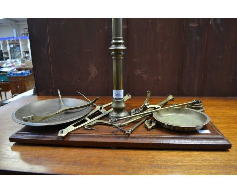 An early 20th Century W&T Avery set of weighing scales, brass column, oak base, made in Birmingham