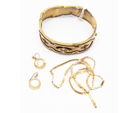 A collection of 9ct gold items to include a Victorian Etruscan revival bangle set with four seed pearls to the front, total g