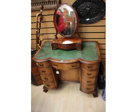 Small knee hole green leather topped desk, a leather stick stand plus a small oval toilet mirror (3)