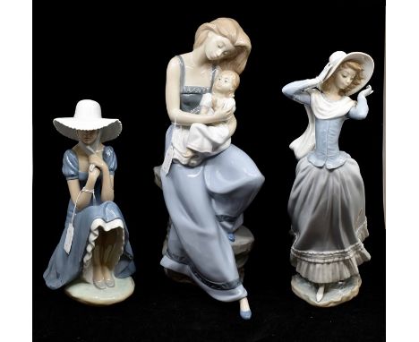 A Lladro figure of a lady wearing a hat, large size, with a Nao figure of mother and child, a Nao figure of a lady seated wea