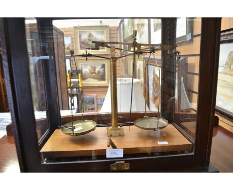 A HL Becker Fils &amp; Co, France, weighing scales, by Henry Louis Becker, hardwood base, with a mahogany glazed display case