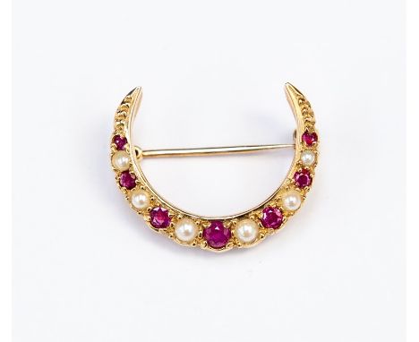 A spinel, ruby and pearl set 9ct gold crescent brooch, comprising alternate pearl and gem set details, length approx. 25mm, p