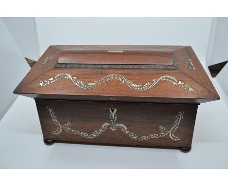 An early Victorian rosewood and mother of pearl tea caddy, with a fitted interior and glass bowl, 18 cms high approx