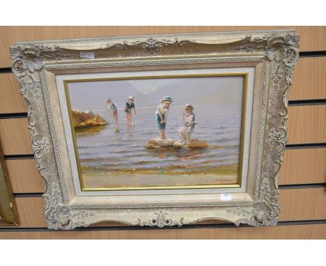 A 1970's P J Attfield oil on board of children playing in the sea