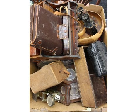 A collection of wooden and treen items including scales, cameras, binoculars, pipe rack, smokers cupboard, figures etc