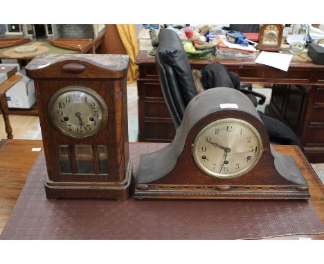 An early 20th Century eight day oak clock, together with a 1920s Westminster chime eight day Napoleon shaped mantle clock (2)