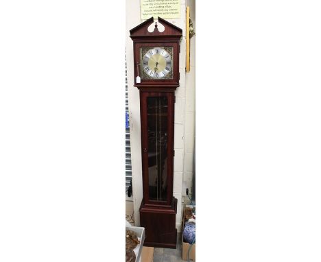 A 20th Century mahogany effect grandmother clock, moulded cornice centred by a turned finial, brass face roman numerals, sing