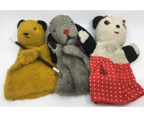 A set of Sooty, Sweep and Sue glove puppets. All complete with Chad Valley labels. (3)