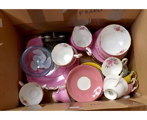 A collection of Aynsley and Paragon tea wares, including cups, saucers and side plates, cake plate, plus a pair of opera glas