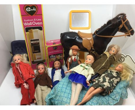 A good collection of Sindy dolls, including Patch. Plus a range of clothes, accessories, boxed Oven and cupboard, Horse, etc