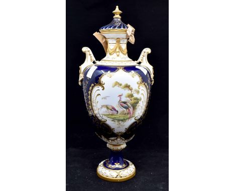 Early 20th Century Royal Worcester vase with lid and birds of paradise decoration A/F. Height approx 37cm