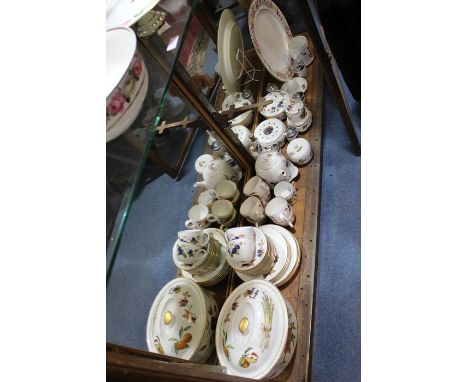 A collection of Royal Worcester "Evesham" dinner ware including tureens, serving dishes, plates and further gilt ware (Q)