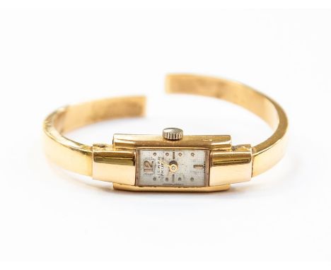 An 18ct gold ladies Art Deco bangle watch