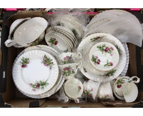 A Royal Albert 'Highland Thistle' tea service, comprising six cups, six saucers, side side plates, six tea plates, six desser