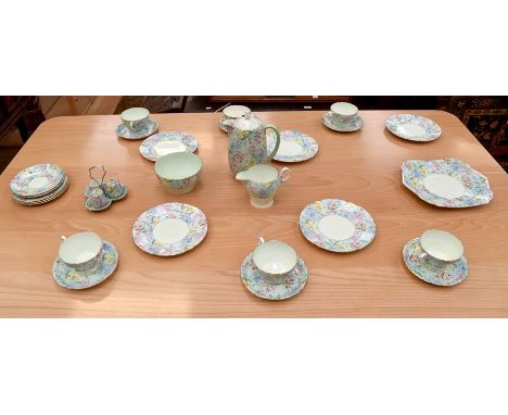 A Shelley 'Melody' teaset set comprising of six teacups and saucers, five side plates, five further smaller plates, condiment