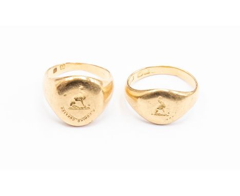 Two 18ct gold signet rings, with engraved&nbsp;griffins and motto seals, sizes K and K1/2, combined total gross weight approx