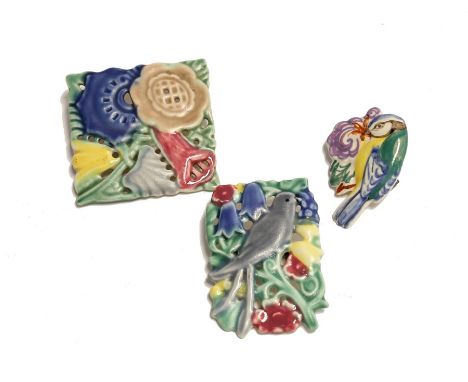 Three Poole Pottery broaches, two with pierces detailing, all marked to backCondition: Chip to reverse of smallest brooch. No