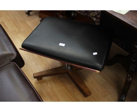 A 1970s teak veneered dressing table stoolPlease note: this item is being sold without the cushion.