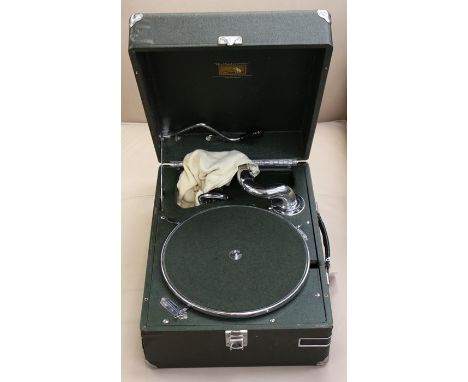 A portable manual drive cased His Masters Voice record player