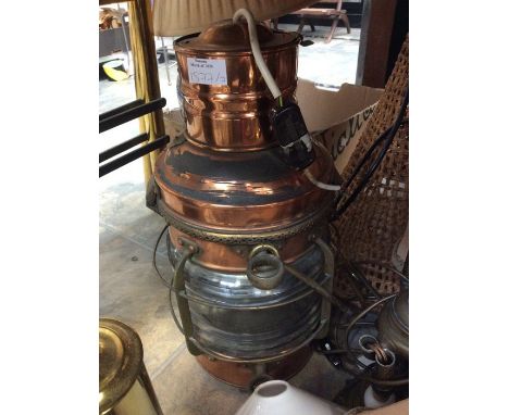 A collection of lighting including a wicker lamp and ships lamp, brass and copper, late 19th Century converted