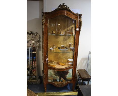 A French Louis XV revival kingwood ormolu mounted vitrine display cabinet, the&nbsp;scrolling floral mounts above&nbsp;single