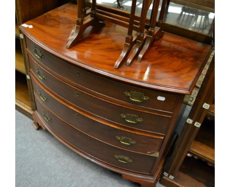 A mahogany bow front four height chest of drawers