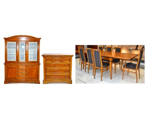 An Eleven Piece Reproduction Fruitwood Dining Suite, comprising a set of eight dining chairs, including two carvers, upholste