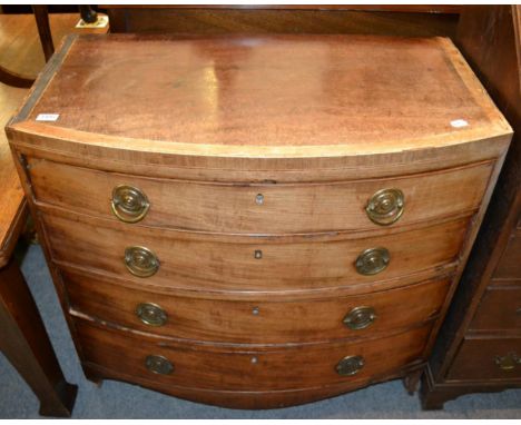 A Georgian bow front mahogany four height chest of drawers 