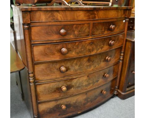 A 19th century mahogany bow fronted five height chest of drawers