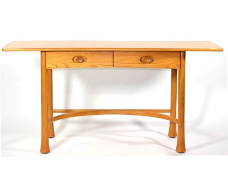 A Light Oak Ercol Limited Edition Kelmscott Side Table, made in 1987 and a signed limited edition of 225, of rounded rectangu