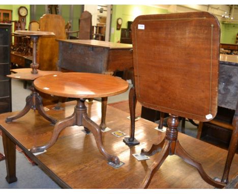 A 19th century brass inlaid tilt top tripod table, a low circular tilt top tripod table and a walnut occasional table with re