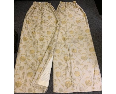 A large pair of cream and gold Damask curtains 335cm wide x 85cm length 